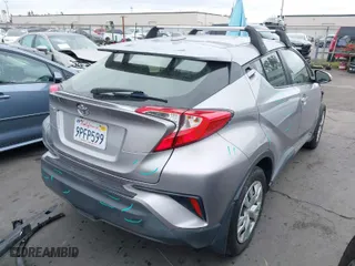 2020 Toyota C-HR LE with VIN JTNKHMBX8L1075302, listed as a IAAI auction lot 41892289 with 51,643 mi miles. Bid and sale history available at carsss.com. Image 4.