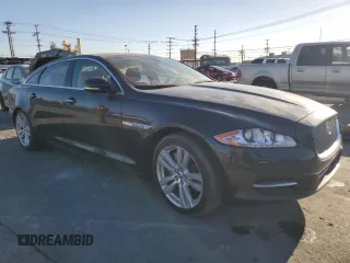 2013 Jaguar XJ with VIN SAJWA2GB0DLV43865, listed as a Copart auction lot 79693934 with 0 mi miles and Salvage Title. Bid and sale history available at carsss.com. Image 4.