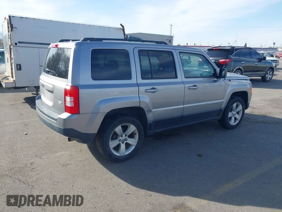 2016 Jeep Patriot High Altitude Edition with VIN 1C4NJRFB1GD712715, listed as a IAAI auction lot 41984245 with 124,227 mi miles. Bid and sale history available at carsss.com. Image 4.