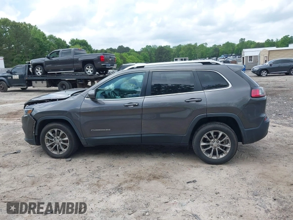 2019 Jeep Cherokee Latitude Plus with VIN 1C4PJLLBXKD305219, listed as a IAAI auction lot 42150283 with 89,000 mi miles and . Bid and sale history available at DreamBid. Image 14.