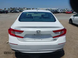 2021 Honda Accord Touring z VIN 1HGCV2F99MA007160, wystawiony jako IAAI lot #42164864 z przebiegiem 64 596 mil mil oraz . Historia ofert i sprzedaży dostępna na DreamBid. Obrazek 16.