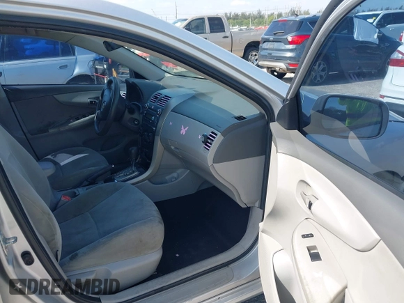 2010 Toyota Corolla with VIN 1NXBU4EE2AZ240438, listed as a IAAI auction lot 42125407 with 185,253 mi miles and . Bid and sale history available at DreamBid. Image 5.