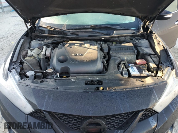 2018 Nissan Maxima Platinum z VIN 1N4AA6AP1JC365650, wystawiony jako Copart lot #45531535 z przebiegiem 159 536 mil mil oraz Szkoda całkowita • Salvage title. Historia ofert i sprzedaży dostępna na DreamBid. Obrazek 13.