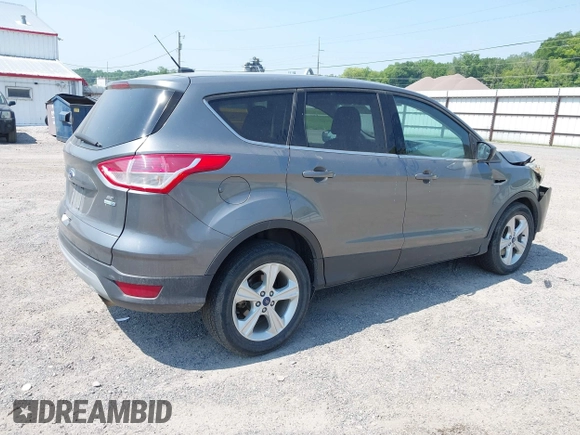 2014 Ford Escape SE with VIN 1FMCU9GXXEUE08655, listed as a IAAI auction lot 42469634 with 163,054 mi miles and . Bid and sale history available at DreamBid. Image 4.