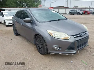 2012 Ford Focus SE z VIN 1FAHP3F24CL186434, wystawiony jako IAAI lot #42583258 z przebiegiem 93 729 mil mil oraz . Historia ofert i sprzedaży dostępna na DreamBid. Obrazek 1.