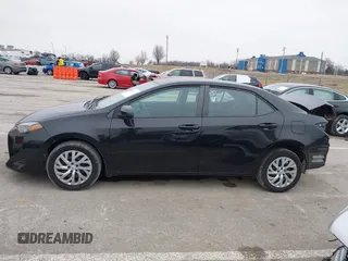 2019 Toyota Corolla L with VIN 5YFBURHE5KP945925, listed as a IAAI auction lot 41493079 with 96,849 mi miles and . Bid and sale history available at carsss.com. Image 15.