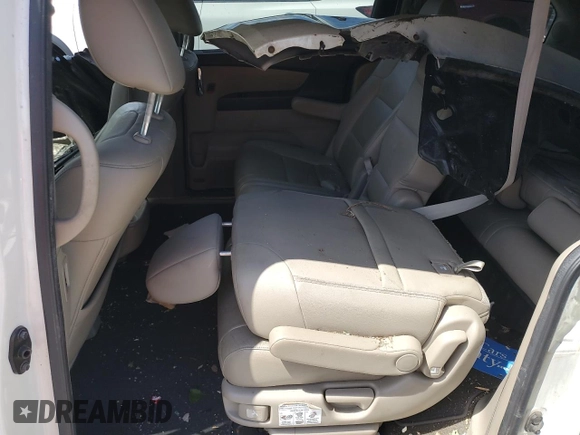 2014 Honda Odyssey Touring with VIN 5FNRL5H98EB053486, listed as a Copart auction lot 58004225 with 201,526 mi miles and Salvage title. Bid and sale history available at DreamBid. Image 11.