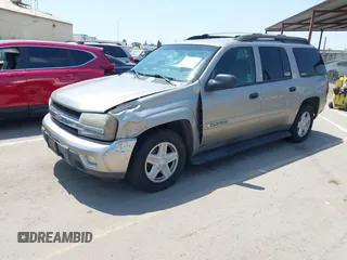 2003 Chevrolet TrailBlazer EXT LT with VIN 1GNES16S736233526, listed as a IAAI auction lot 42193747 with 197,471 mi miles. Bid and sale history available at carsss.com. Image 2.
