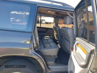 2003 Lexus LX with VIN JTJHT00W033531066, listed as a IAAI auction lot 41969617 with 209,710 mi miles. Bid and sale history available at carsss.com. Image 8.