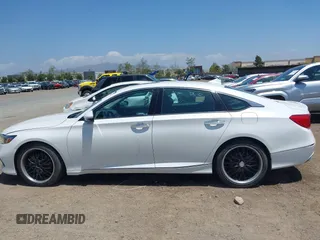 2021 Honda Accord Touring z VIN 1HGCV2F99MA007160, wystawiony jako IAAI lot #42164864 z przebiegiem 64 596 mil mil oraz . Historia ofert i sprzedaży dostępna na DreamBid. Obrazek 14.