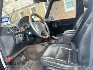 2002 Mercedes-Benz G-Class with VIN WDCYR49E22X132146, listed as a Copart auction lot 87416074 with 208,917 mi miles and Salvage Title. Bid and sale history available at carsss.com. Image 5.