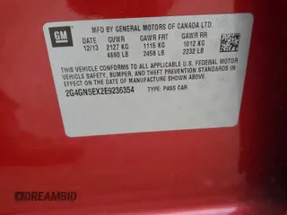 2014 Buick Regal Premium I z VIN 2G4GN5EX2E9236354, wystawiony jako Copart lot #56897205 z przebiegiem 77 147 mil mil oraz Szkoda całkowita • Salvage title. Historia ofert i sprzedaży dostępna na DreamBid. Obrazek 12.