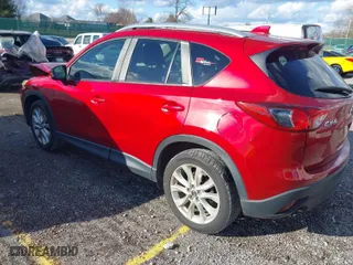 2014 Mazda CX-5 Grand Touring with VIN JM3KE2DY8E0373064, listed as a IAAI auction lot 41683791 with 186,970 mi miles. Bid and sale history available at carsss.com. Image 3.