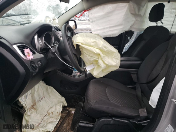 2015 Dodge Journey American Value Pkg with VIN 3C4PDCAB5FT574397, listed as a Copart auction lot 42032415 with 118,111 mi miles and Salvage Title. Bid and sale history available at carsss.com. Image 7.