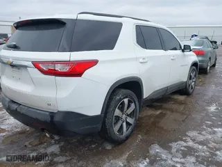 2021 Chevrolet Traverse LT Leather with VIN 1GNERHKWXMJ218191, listed as a IAAI auction lot 41512332 with 87,206 mi miles. Bid and sale history available at carsss.com. Image 4.