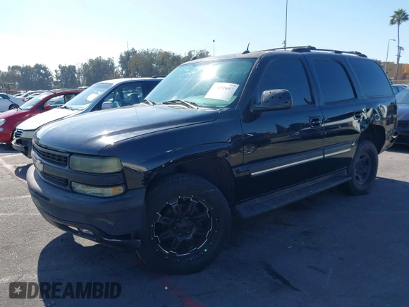 2004 Chevrolet Tahoe LS with VIN 1GNEC13T94J331286, listed as a IAAI auction lot 40691697 with 211,544 mi miles. Bid and sale history available at carsss.com. Image 2.