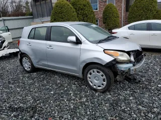 2012 Scion xD with VIN JTKKU4B47C1027093, listed as a Copart auction lot 52070435 with 64,032 mi miles and Clean Title. Bid and sale history available at DreamBid. Image 4.