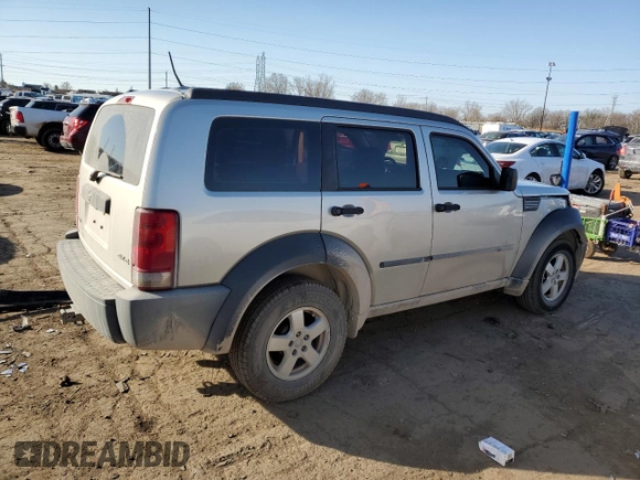 2008 Dodge Nitro SXT z VIN 1D8GU28K98W138540, wystawiony jako Copart lot #53465375 z przebiegiem 92 842 mil mil oraz Czysty tytuł • Clean title. Historia ofert i sprzedaży dostępna na DreamBid. Obrazek 3.