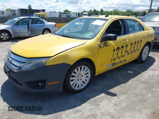 2012 Ford Fusion Hybrid with VIN 3FADP0L31CR284736, listed as a IAAI auction lot 42246142 with 384,612 mi miles and . Bid and sale history available at DreamBid. Image 2.