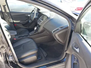 2015 Ford Focus Titanium with VIN 1FADP3J22FL323185, listed as a IAAI auction lot 41461154 with 125,477 mi miles and . Bid and sale history available at carsss.com. Image 5.
