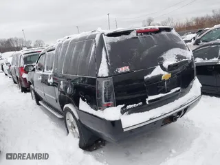 2012 Chevrolet Suburban LTZ with VIN 1GNSKKE75CR215742, listed as a IAAI auction lot 41236729 with 250,634 mi miles. Bid and sale history available at carsss.com. Image 3.
