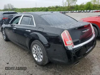 2013 Chrysler 300 with VIN 2C3CCAET1DH568910, listed as a Copart auction lot 50037004 with 136,228 mi miles and Salvage Title. Bid and sale history available at carsss.com. Image 2.