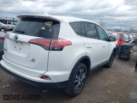 2018 Toyota RAV4 LE with VIN 2T3BFREVXJW793174, listed as a IAAI auction lot 42037936 with 82,304 mi miles. Bid and sale history available at carsss.com. Image 4.