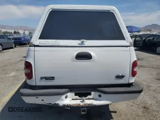 1999 Ford F-150 XL with VIN 1FTZX0726XKA98752, listed as a Copart auction lot 58986695 with Not provided miles and Salvage title. Bid and sale history available at DreamBid. Image 6.