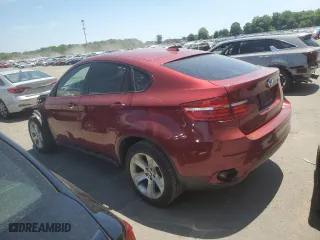 2014 BMW X6 xDrive35i with VIN 5UXFG2C50E0H10887, listed as a Copart auction lot 59720394 with 157,004 mi miles and Salvage Title. Bid and sale history available at carsss.com. Image 2.