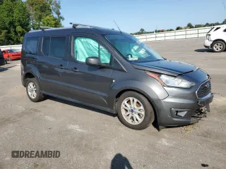 2021 Ford Transit Connect XLT with VIN NM0GS9F27M1504144, listed as a Copart auction lot 70214034 with 45,827 mi miles and Salvage title. Bid and sale history available at DreamBid. Image 4.