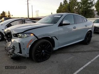 2024 BMW X6 xDrive40i with VIN 5UX33EX04R9T50214, listed as a Copart auction lot 85332204 with 8,710 mi miles and Salvage Title. Bid and sale history available at carsss.com. Image 1.