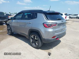 2018 Jeep Compass Trailhawk with VIN 3C4NJDDB2JT198784, listed as a IAAI auction lot 42405539 with 121,553 mi miles and . Bid and sale history available at DreamBid. Image 3.