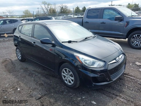 2014 Hyundai Accent GS with VIN KMHCT5AE3EU193249, listed as a IAAI auction lot 41973614 with 136,655 mi miles. Bid and sale history available at carsss.com. Image 1.