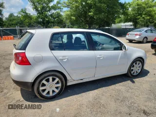 2009 Volkswagen Rabbit S with VIN WVWDB71K79W120196, listed as a Copart auction lot 62126625 with 105,695 mi miles and Salvage title. Bid and sale history available at DreamBid. Image 3.