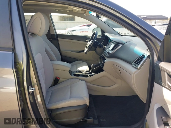 2017 Hyundai Tucson Sport z VIN KM8J33A25HU562988, wystawiony jako IAAI lot #41755874 z przebiegiem 112 000 mil mil oraz . Historia ofert i sprzedaży dostępna na DreamBid. Obrazek 5.