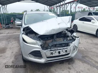 2013 Ford Escape SEL z VIN 1FMCU9H97DUA34665, wystawiony jako IAAI lot #42258567 z przebiegiem 174 227 mil mil oraz . Historia ofert i sprzedaży dostępna na DreamBid. Obrazek 12.