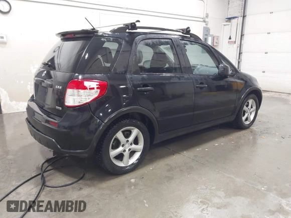 2009 Suzuki SX4 Man AWD with VIN JS2YB413596200885, listed as a IAAI auction lot 41189776 with 111,891 mi miles. Bid and sale history available at carsss.com. Image 4.