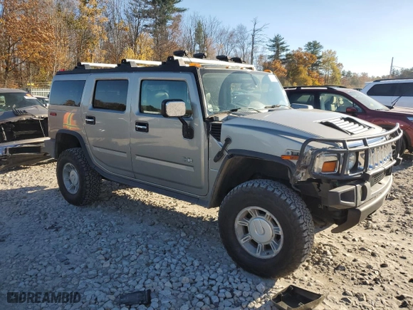 2003 Hummer H2 with VIN 5GRGN23U23H138301, listed as a Copart auction lot 77449044 with 172,174 mi miles and Salvage Title. Bid and sale history available at carsss.com. Image 4.