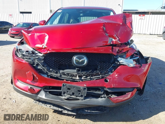 2020 Mazda CX-5 Touring with VIN JM3KFACM1L0756864, listed as a IAAI auction lot 41761131 with 16,646 mi miles and . Bid and sale history available at carsss.com. Image 12.