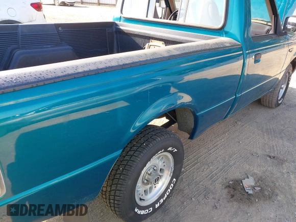 1994 Ford Ranger XLT with VIN 1FTCR10X5RUA01060, listed as a IAAI auction lot 42060781 with 47,499 mi miles. Bid and sale history available at carsss.com. Image 12.