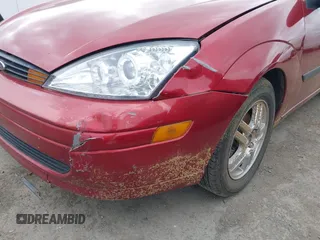 2003 Ford Focus ZX3 with VIN 3FAFP31Z23R187918, listed as a IAAI auction lot 41969325 with Not provided miles and . Bid and sale history available at DreamBid. Image 6.