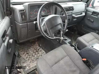 2003 Jeep Wrangler Sport z VIN 1J4FA49S13P374688, wystawiony jako Copart lot #58296735 z przebiegiem 184 554 mil mil oraz Czysty tytuł • Clean title. Historia ofert i sprzedaży dostępna na DreamBid. Obrazek 8.