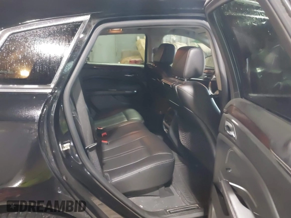 2012 Cadillac SRX Performance Collection z VIN 3GYFNEE37CS630391, wystawiony jako IAAI lot #42280516 z przebiegiem 137 330 mil mil oraz . Historia ofert i sprzedaży dostępna na DreamBid. Obrazek 8.