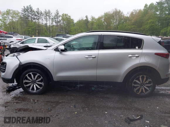 2018 Kia Sportage EX z VIN KNDPNCAC8J7309766, wystawiony jako IAAI lot #42219243 z przebiegiem 90 745 mil mil oraz . Historia ofert i sprzedaży dostępna na DreamBid. Obrazek 14.