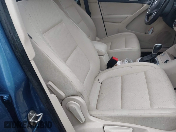 2017 Volkswagen Tiguan S with VIN WVGBV7AX8HK009247, listed as a IAAI auction lot 41346498 with 190,952 mi miles and . Bid and sale history available at DreamBid. Image 5.
