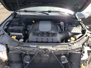 2013 Jeep Grand Cherokee Overland with VIN 1C4RJFCT2DC576125, listed as a Copart auction lot 52595165 with 100,361 mi miles and Salvage Title. Bid and sale history available at carsss.com. Image 12.