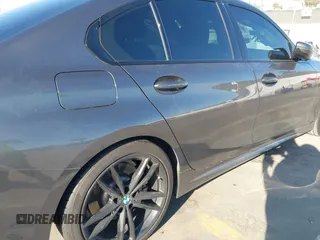 2021 BMW 3 Series 330i z VIN 3MW5R1J08M8B94401, wystawiony jako IAAI lot #41760747 z przebiegiem Nie podano mil oraz . Historia ofert i sprzedaży dostępna na DreamBid. Obrazek 6.