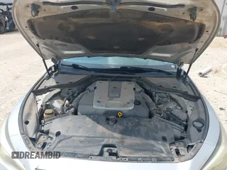 2015 Infiniti Q50 Premium with VIN JN1BV7AP0FM342504, listed as a IAAI auction lot 42127971 with 266,794 mi miles. Bid and sale history available at carsss.com. Image 10.