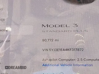 2019 Tesla Model 3 Mid Range z VIN 5YJ3E1EA4KF317872, wystawiony jako IAAI lot #41491269 z przebiegiem 90 772 mil mil oraz . Historia ofert i sprzedaży dostępna na DreamBid. Obrazek 14.