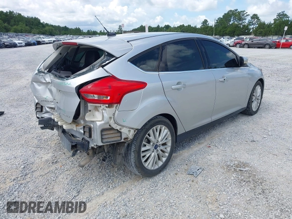 2018 Ford Focus Titanium with VIN 1FADP3N29JL232336, listed as a IAAI auction lot 42485243 with 82,113 mi miles and . Bid and sale history available at DreamBid. Image 4.